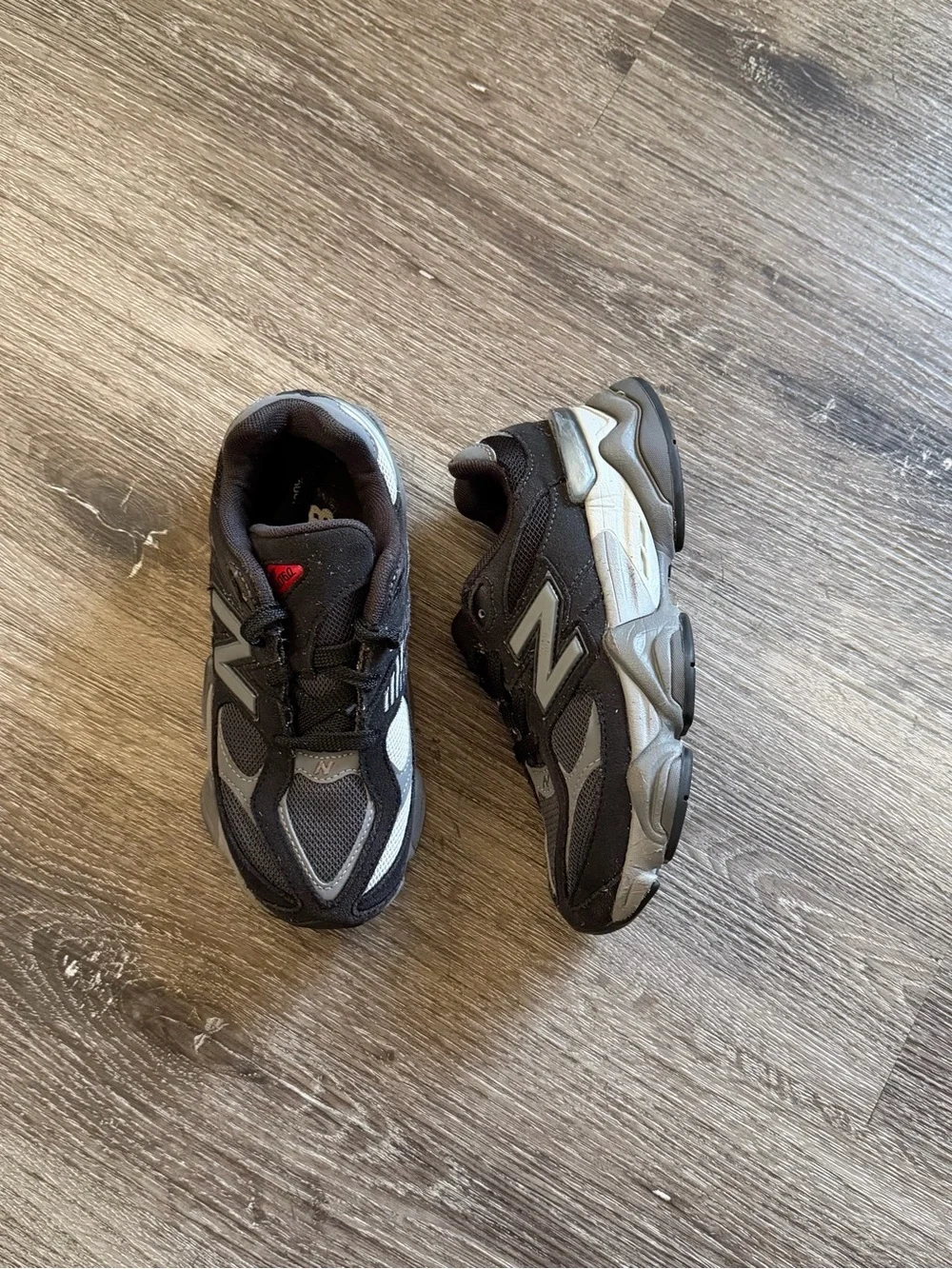 New Balance Kids Black and Gray Athletic Sneakers with Red Accent